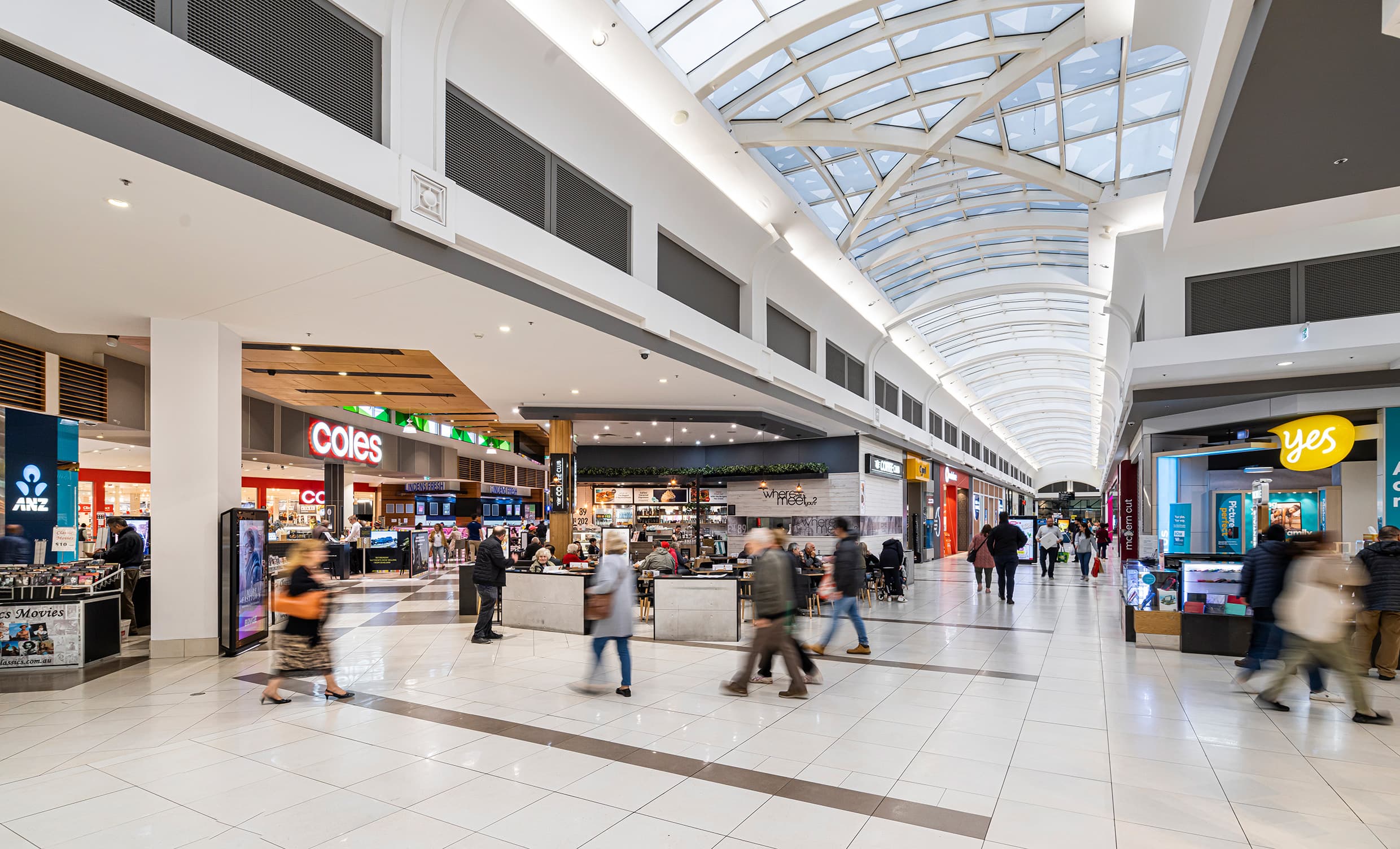 People walking through mall in centre